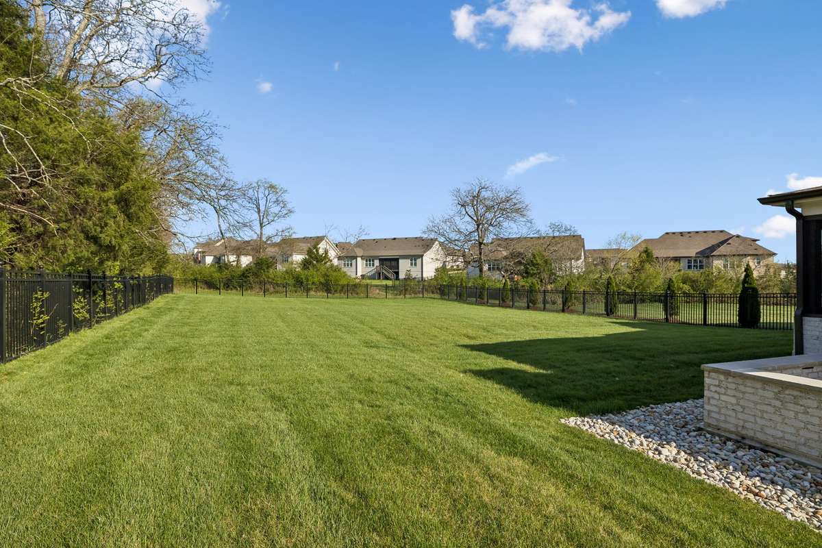 The large flat lot is perfect for kids or pets to play in.