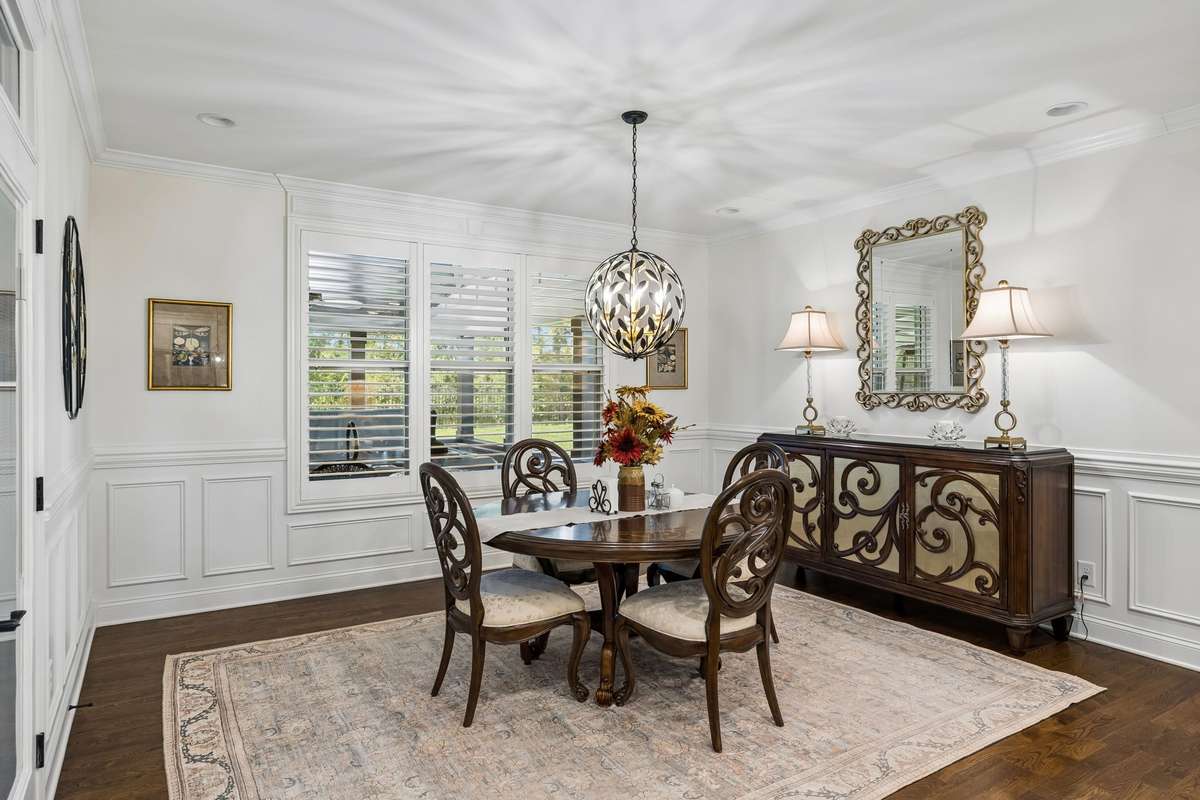 The dining area is spacious and provides natural light.