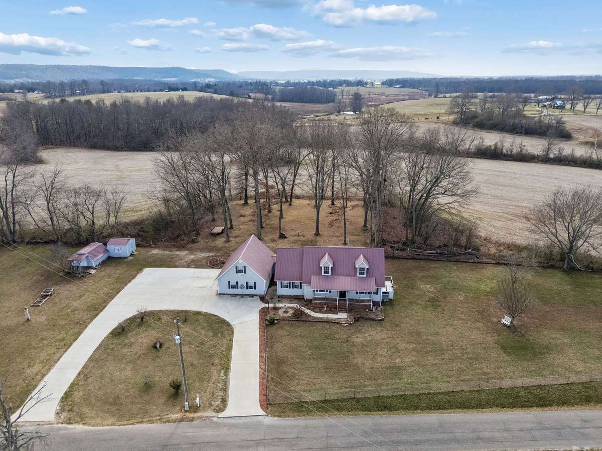 Farms both in front and behind the home. Very private!!