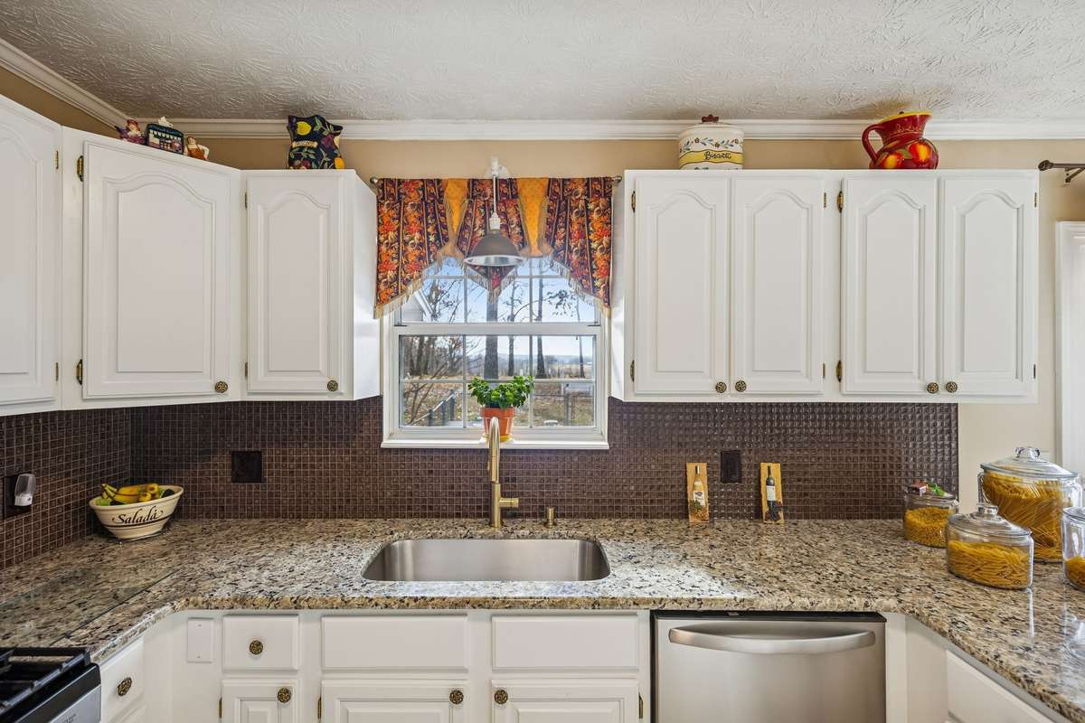 Deep kitchen sink with amazing views out of the kitchen.