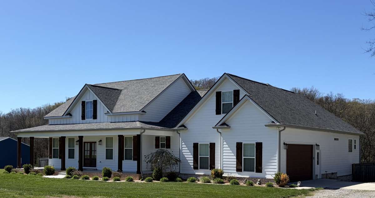 Closer veiew of home featuring  lots of windows for natural light.