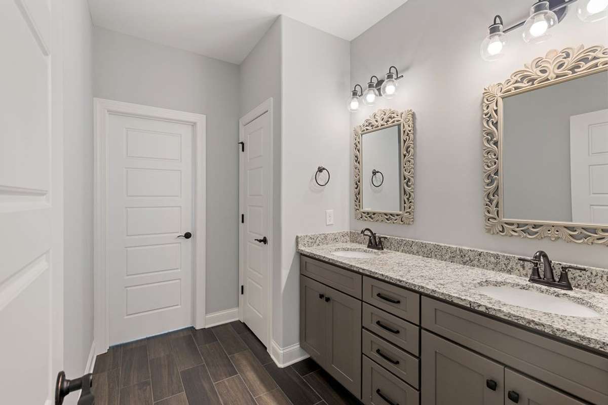 Master Bath has Double Sinks with Granite Counter Tops
