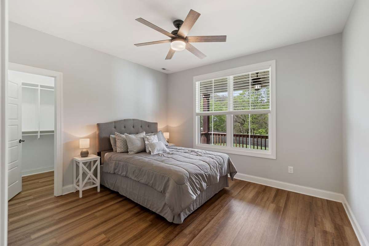 2nd  Bedroom with large walk-in closet, Wood floors and Double Windows for all the views