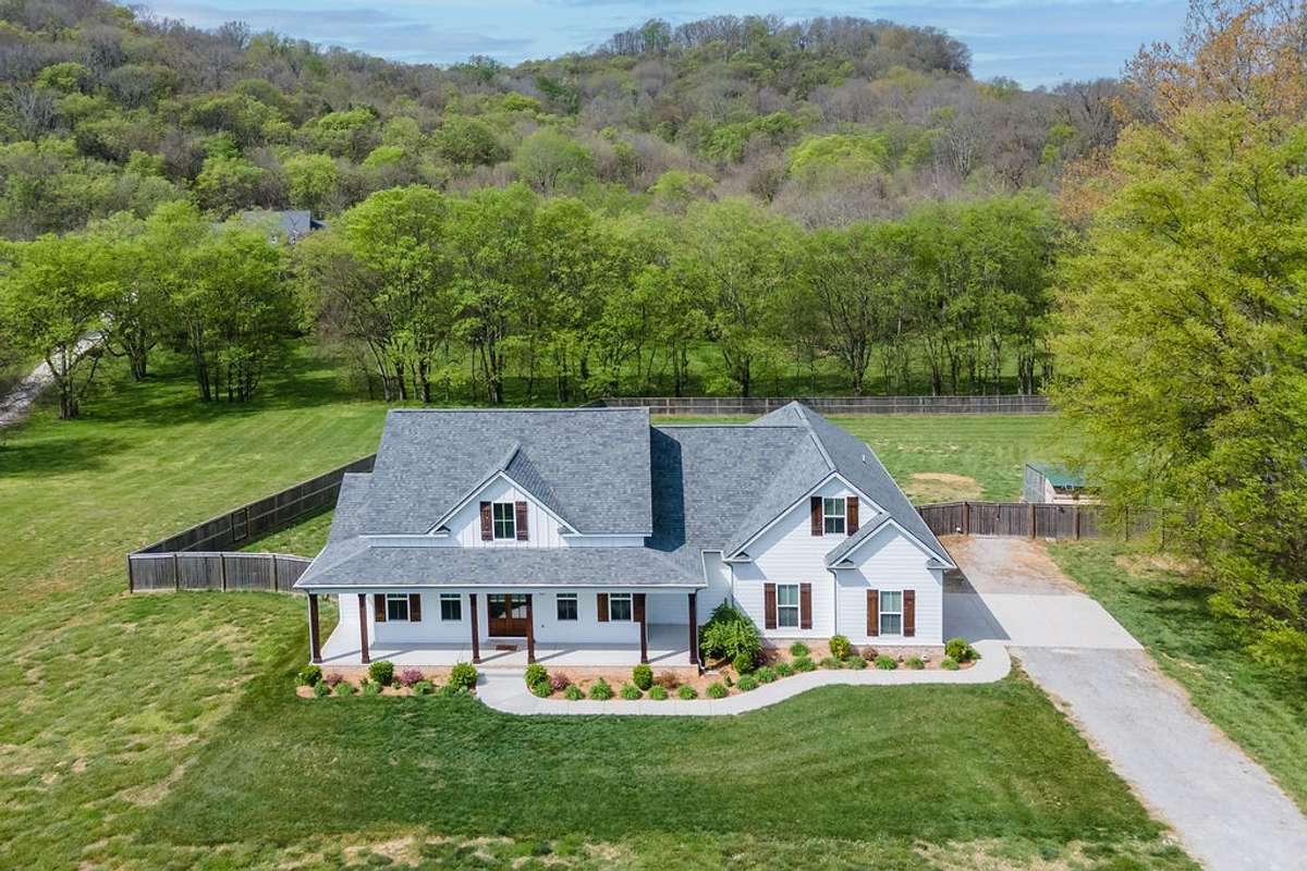 Drone View of Home showing land (12 Acres) surrounding this beautiful 2514 sq/ft