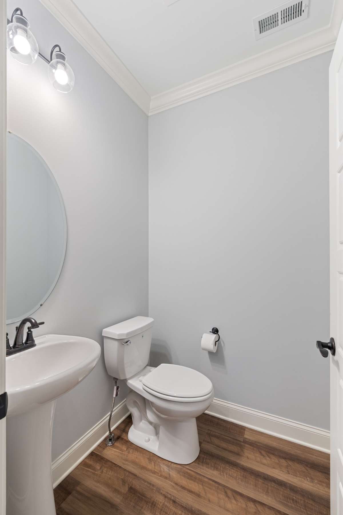 Half Bath for your Guest with Wood Floors