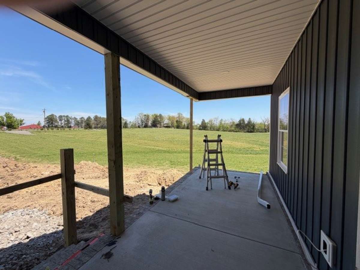 Rocking chair front porch
Sits back off the road