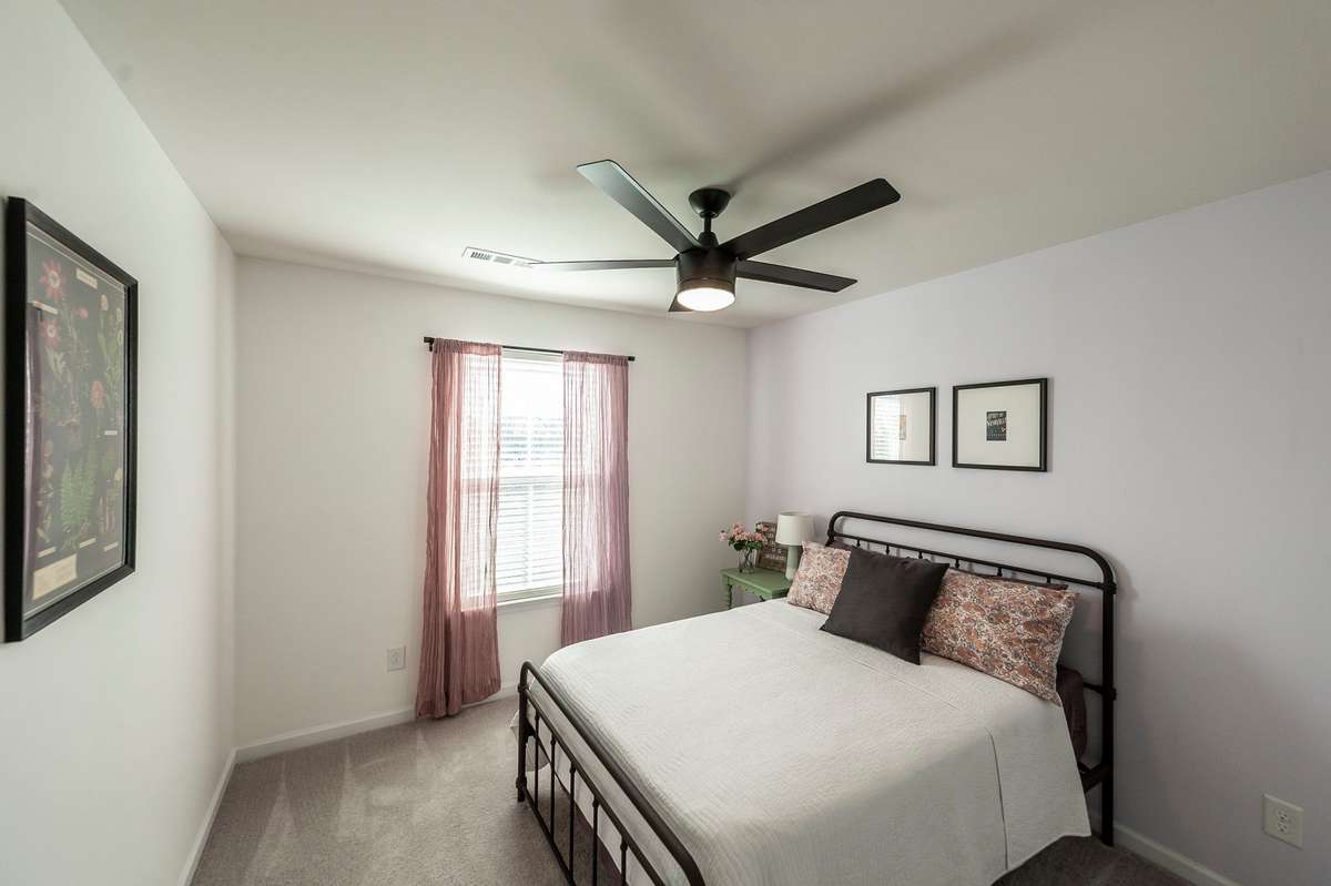 Both bedrooms feature neutral finishes, allowing easy personalization to fit any style or decor.