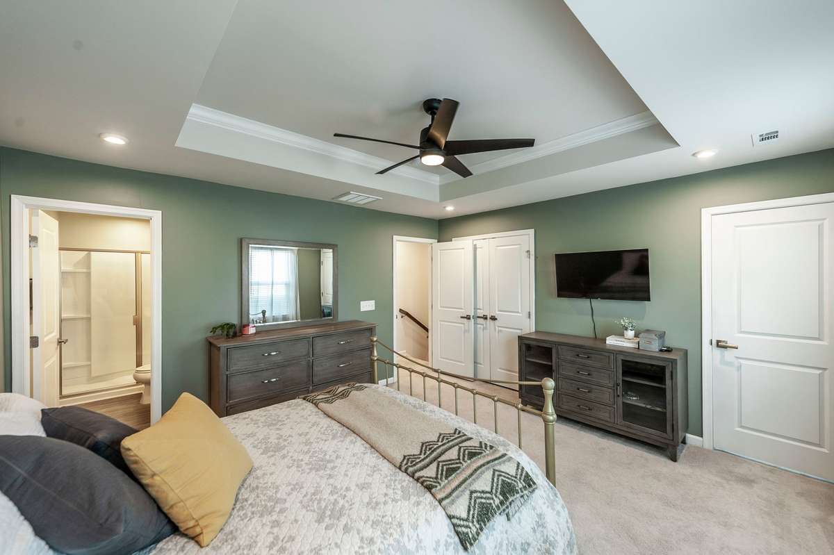 Double closets provide abundant storage, including a convenient walk-in closet for clothing and personal items.