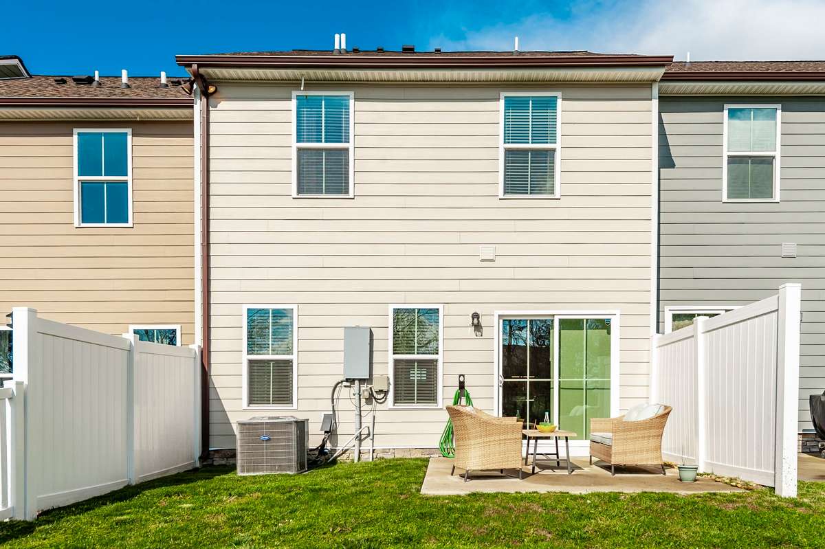 Spacious patio allows plenty of room for outdoor furniture, dining, and gatherings with family and friends.