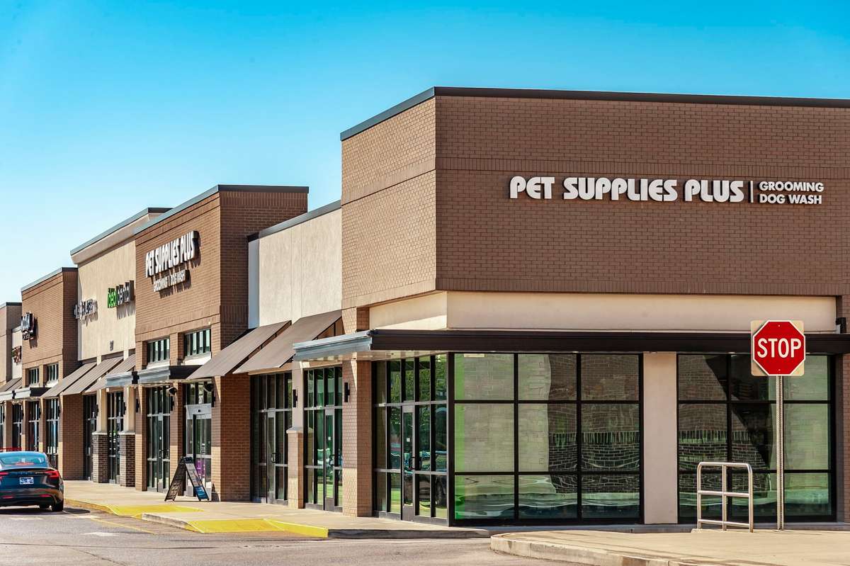 Pet supply store just a short walk away ensures your furry friends have everything they need.