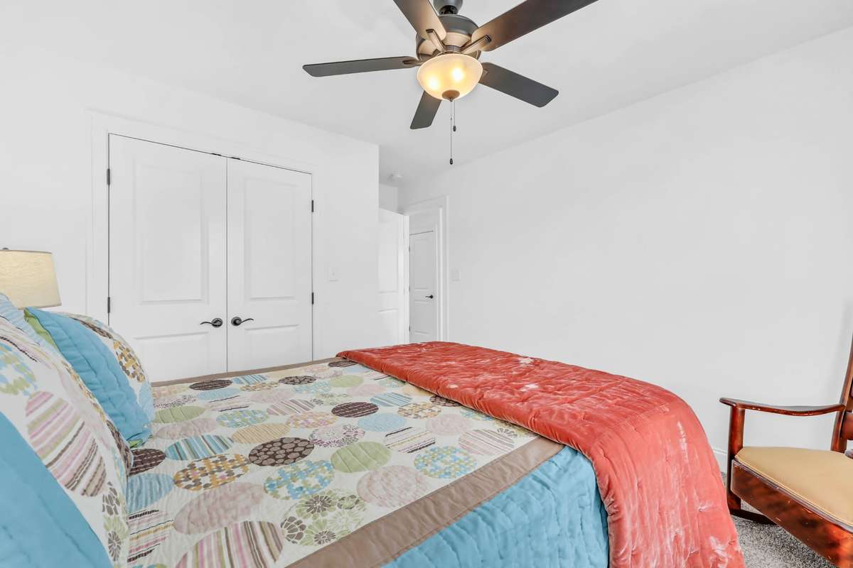 It has a large closet with double doors.