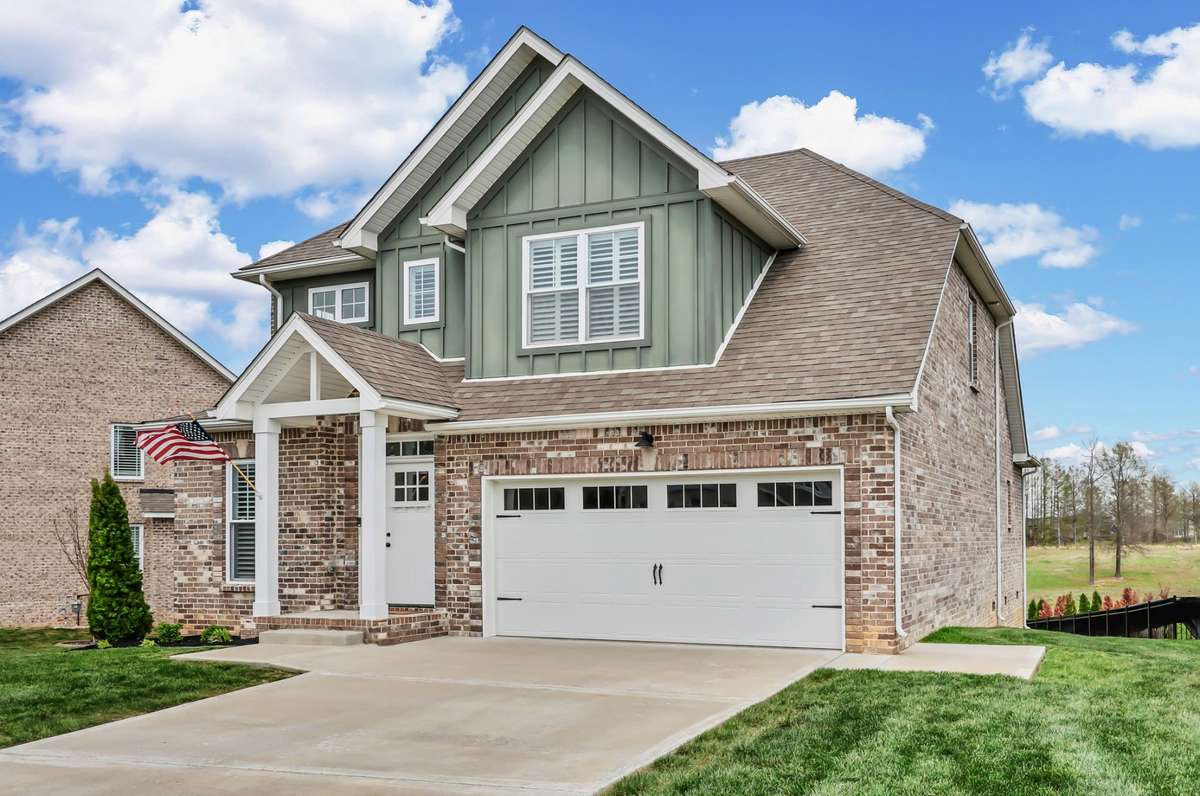 The exterior is mostly brick with board-n-bat trim!