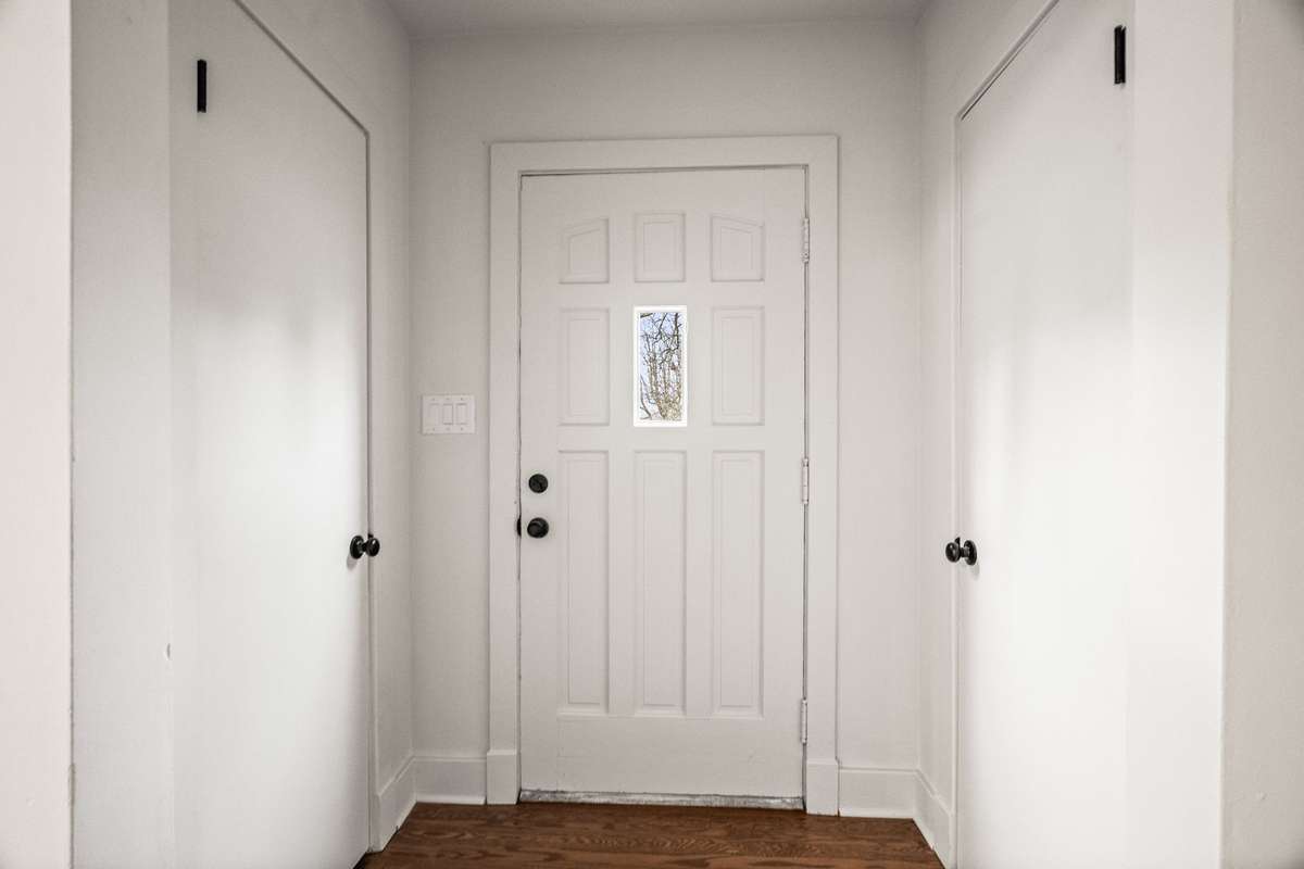 Entry with twin coat closets