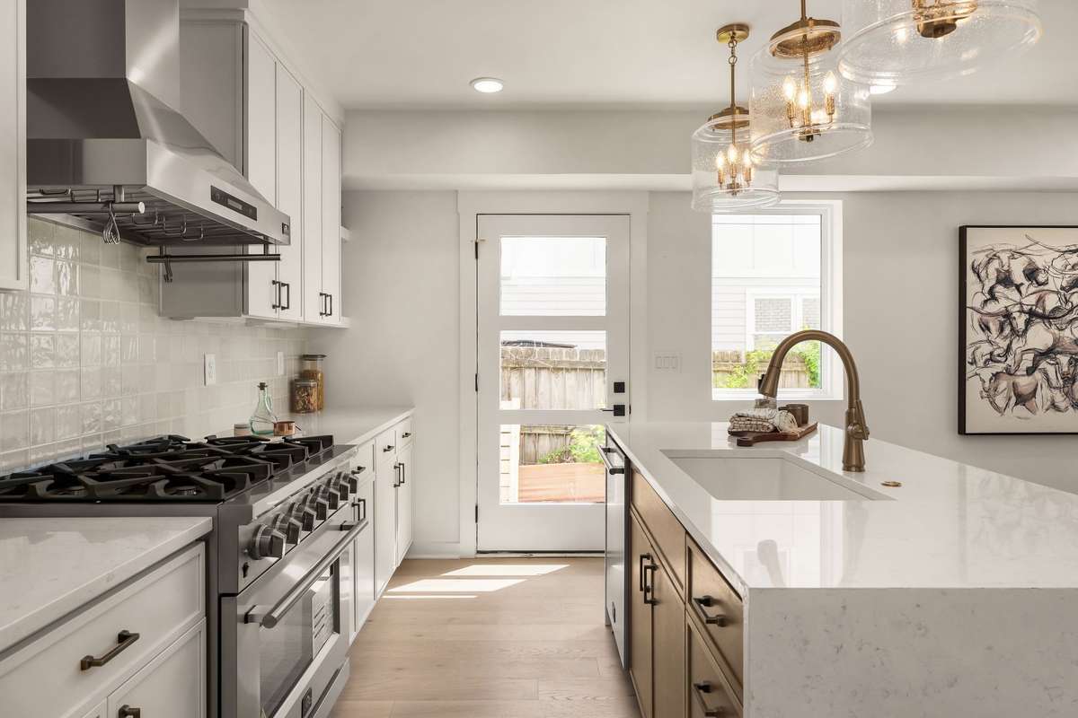 Side door entry from parking area and side yard into the kitchen