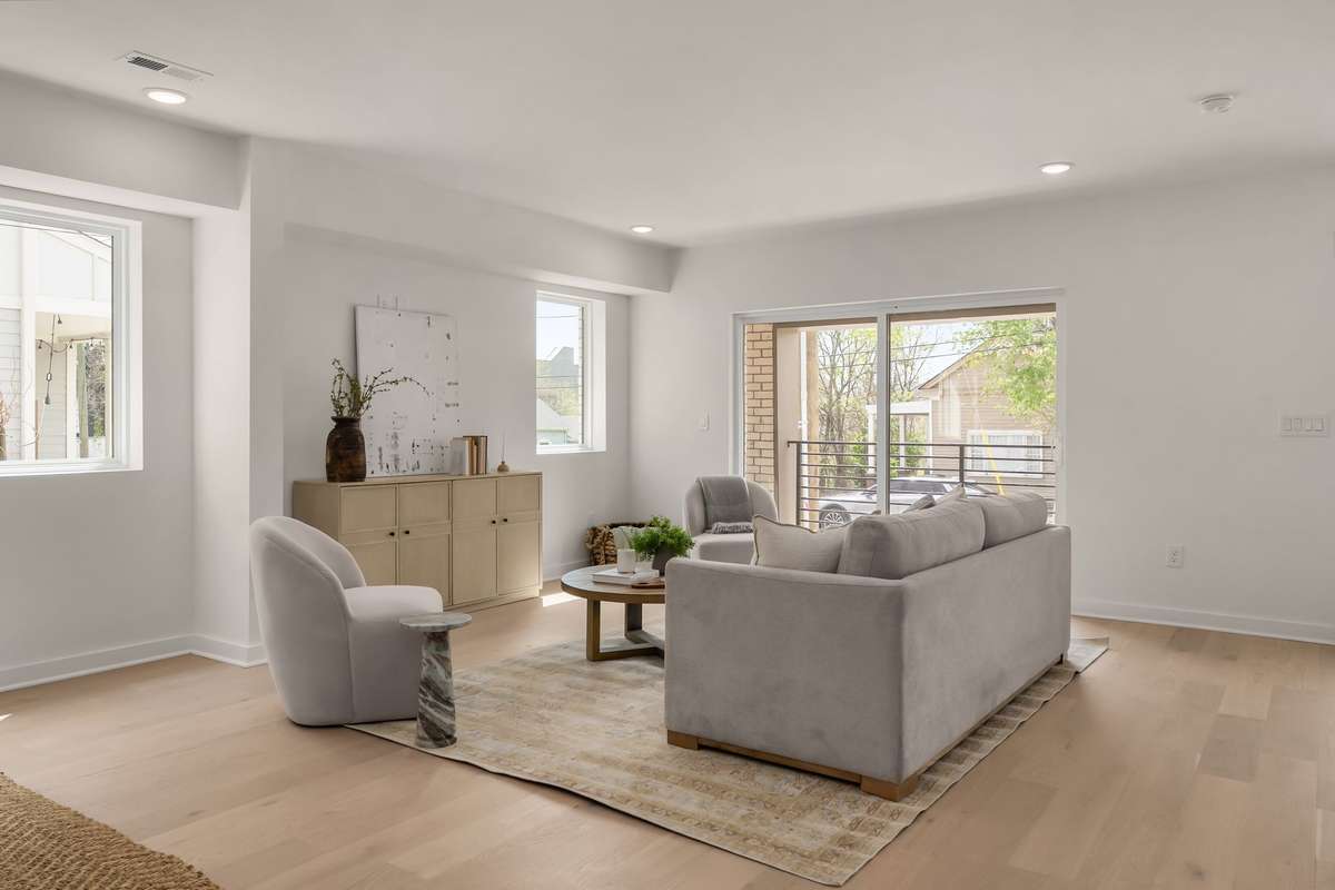 Living room with front porch for additional living and entertaining space