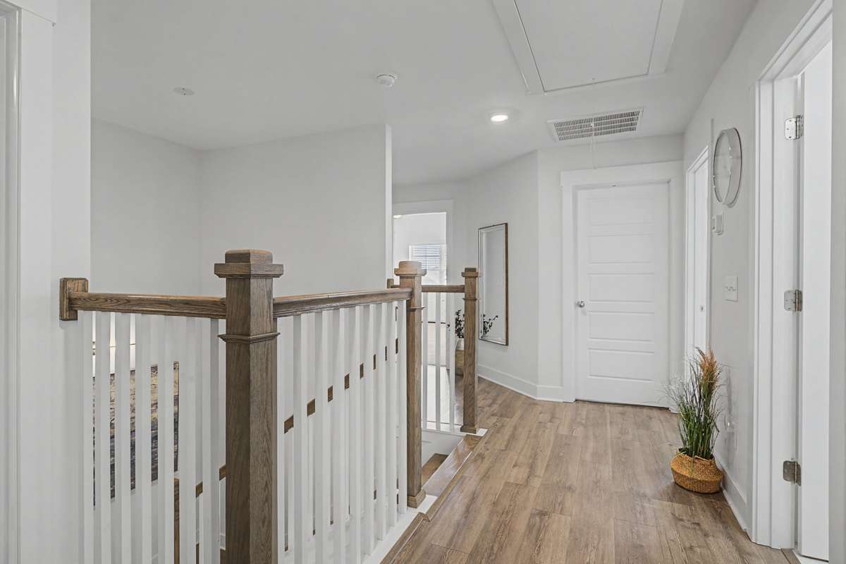 Wood stairs and hallway on laminate! Carpet in only located in the rooms!