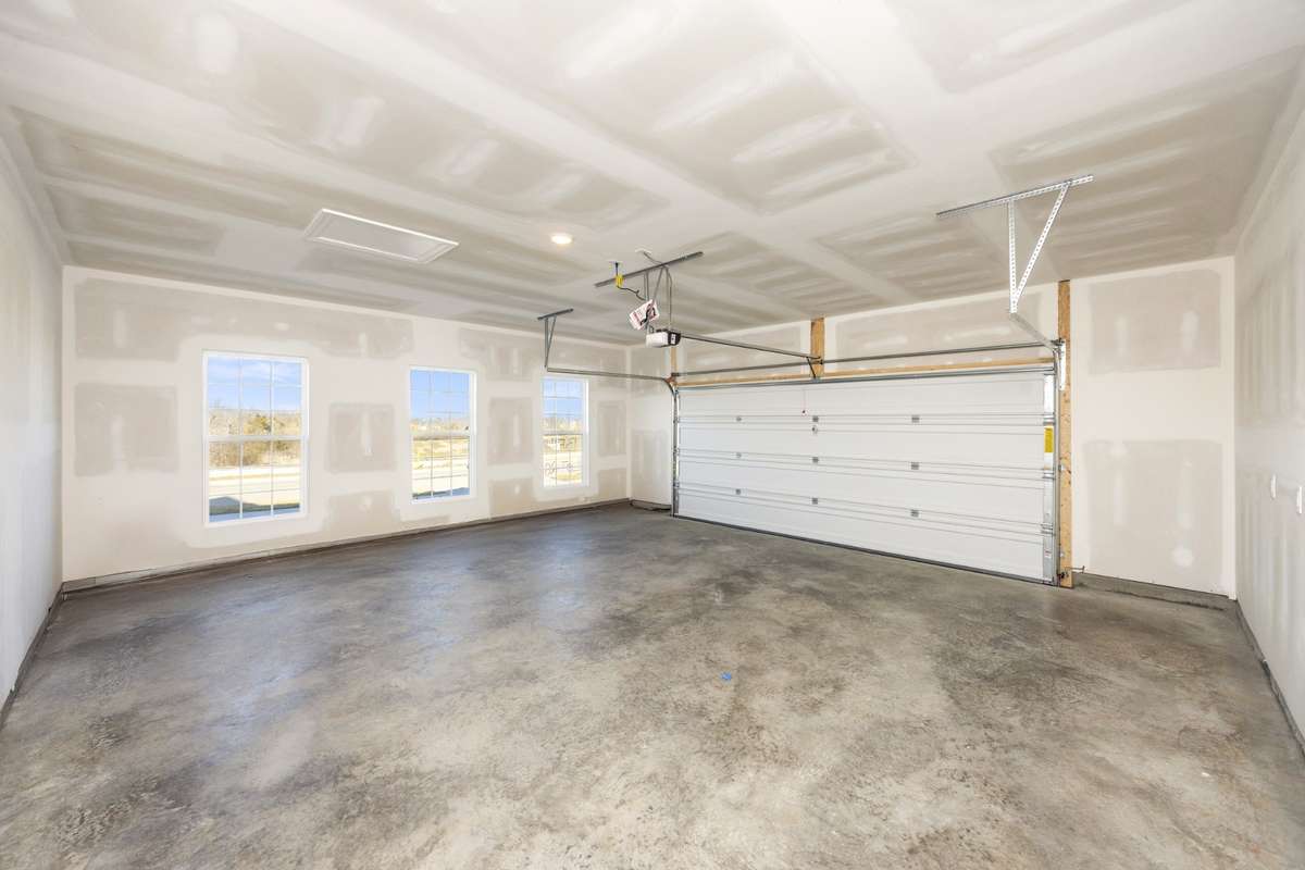 Side entry garage, level 1 finish with full drywall!