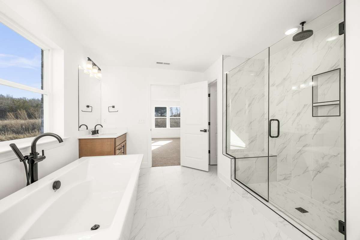 Rainfall shower head and oversized soaking tub!