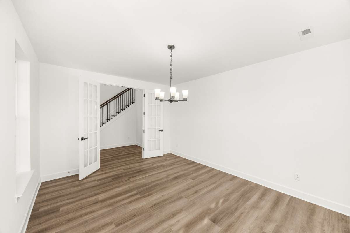 A flex room perfect for a home office, formal dining or a hobby room!