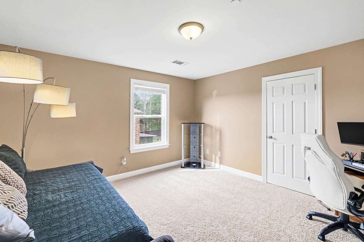 Bedroom 3 is Generously sized with a flexible layout, perfect for a guest room, home office, or additional living space.