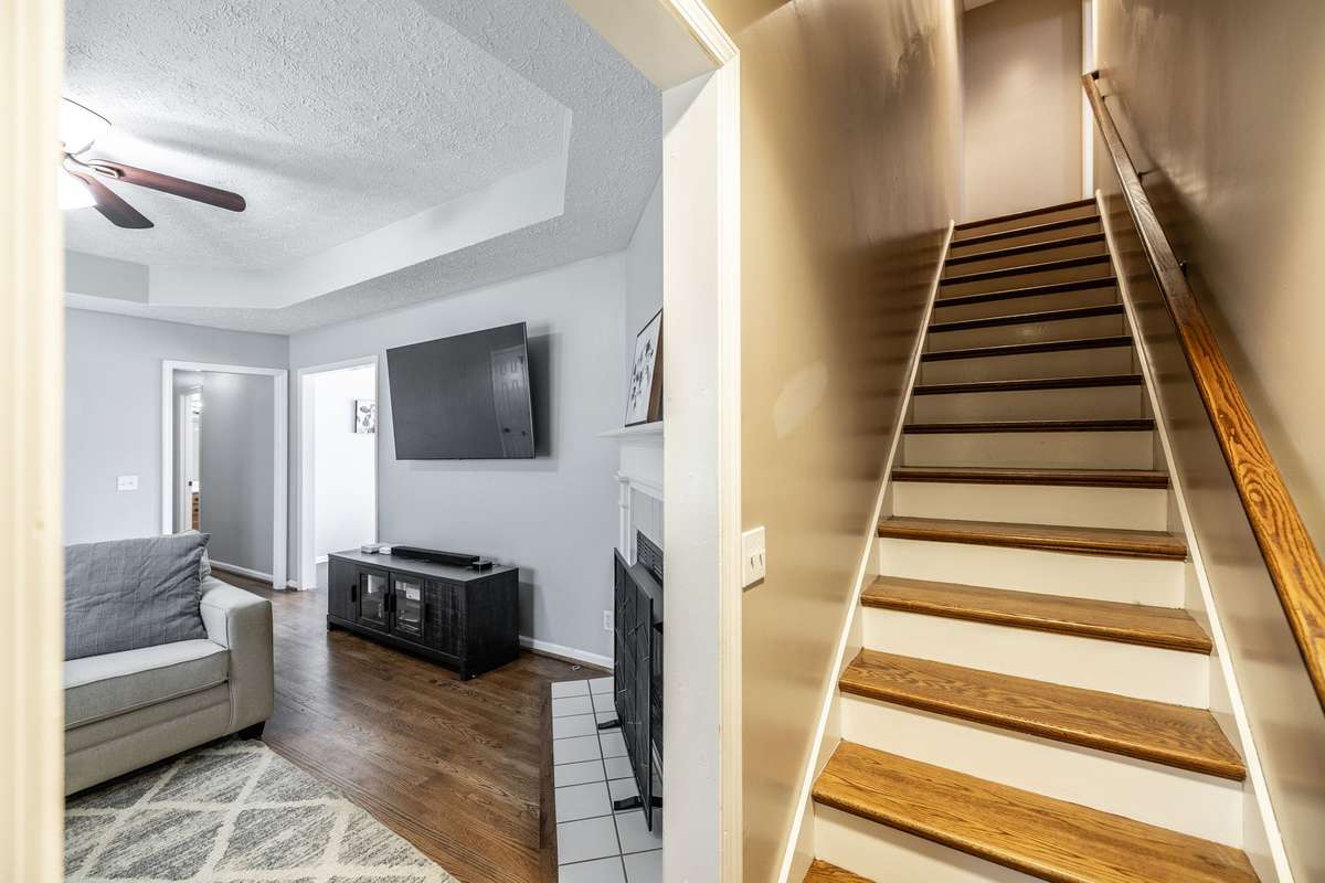 Stairs lead up to large second primary bedroom with large ensuite bath!