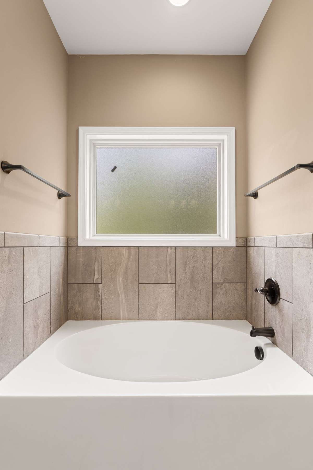 Separate tub in the primary bath.