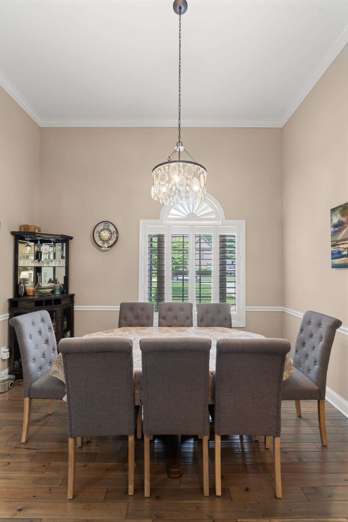 Separate formal dining room with plantation shutters.