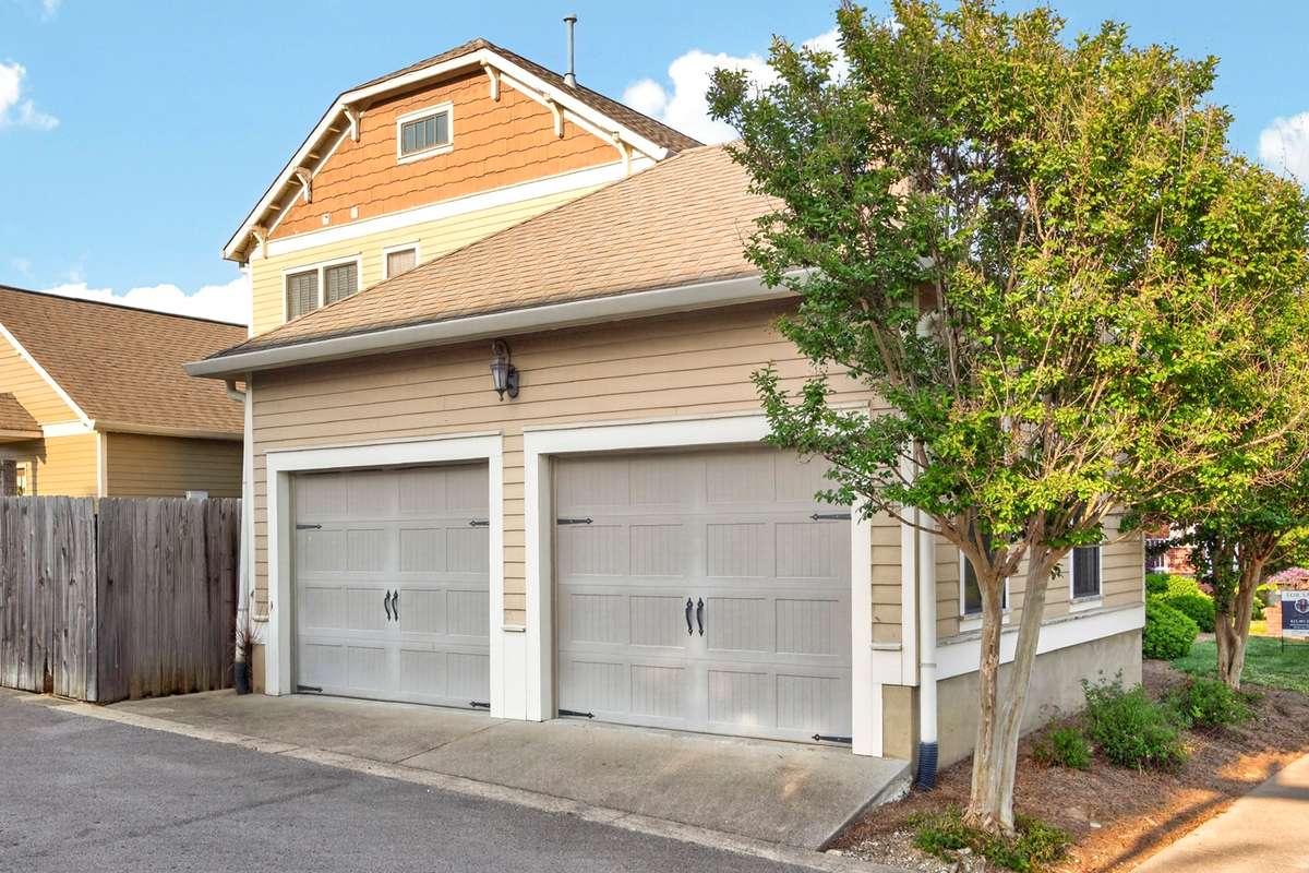 Back of home facing two car garage.