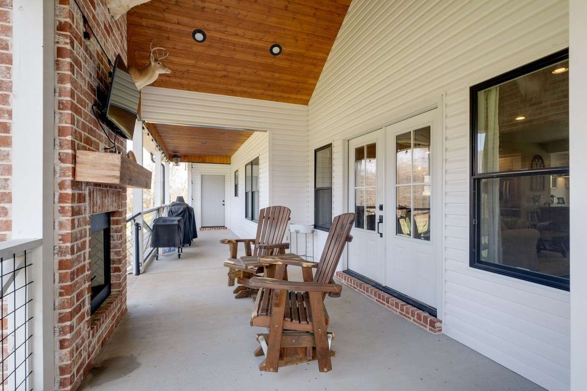 FABULOUS Outdoor Entertainment Area!!! 
STUNNING Wood Plank Ceiling + Outdoor Fireplace