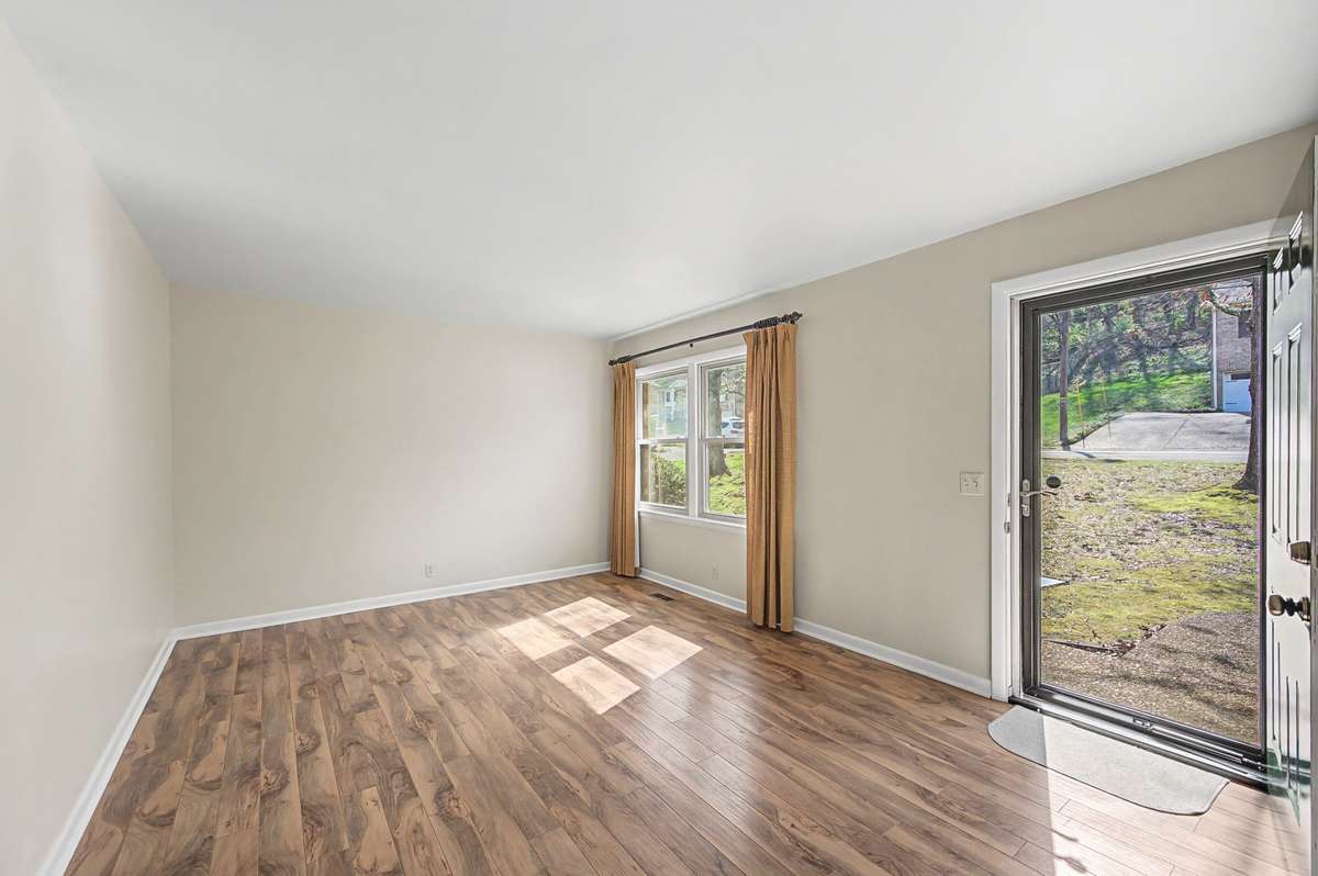 Vinyl floors, new neutral paint throughout. Also vinyl Pella Windows have been replaced by this owner.