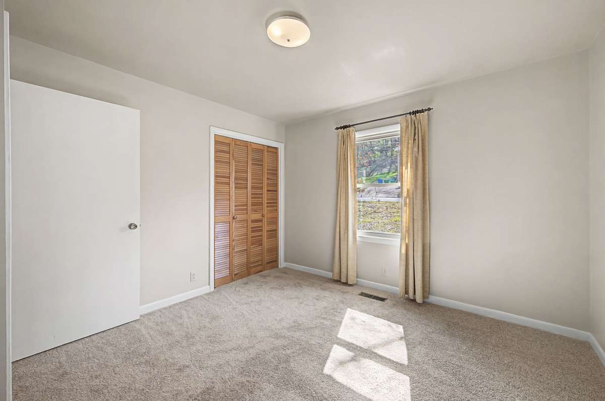 Front corner bedroom with great closet.