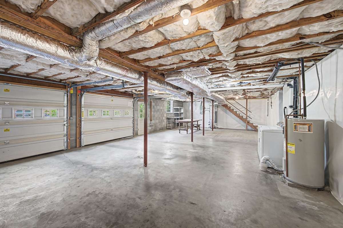 Two car garage is part of the basement. No door openers but easy enough to install.