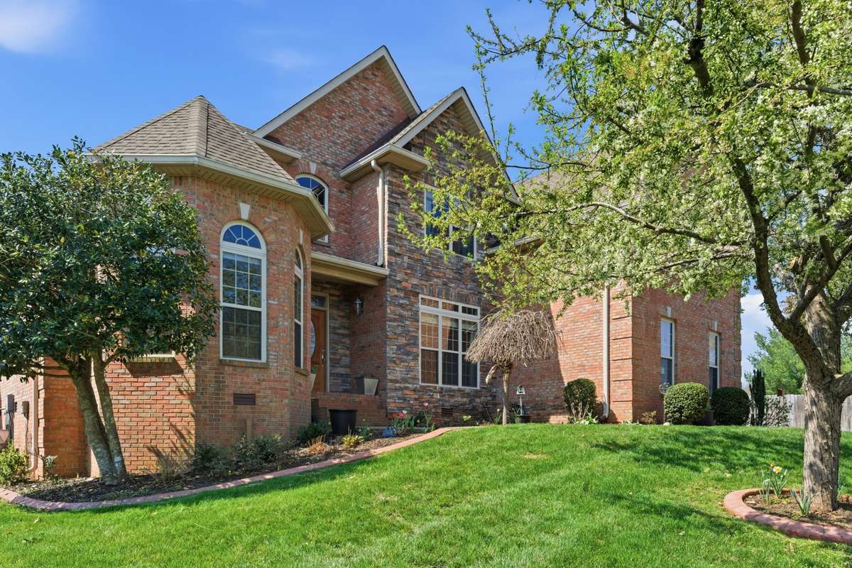 Well maintained landscaping all the way around this beautiful home.