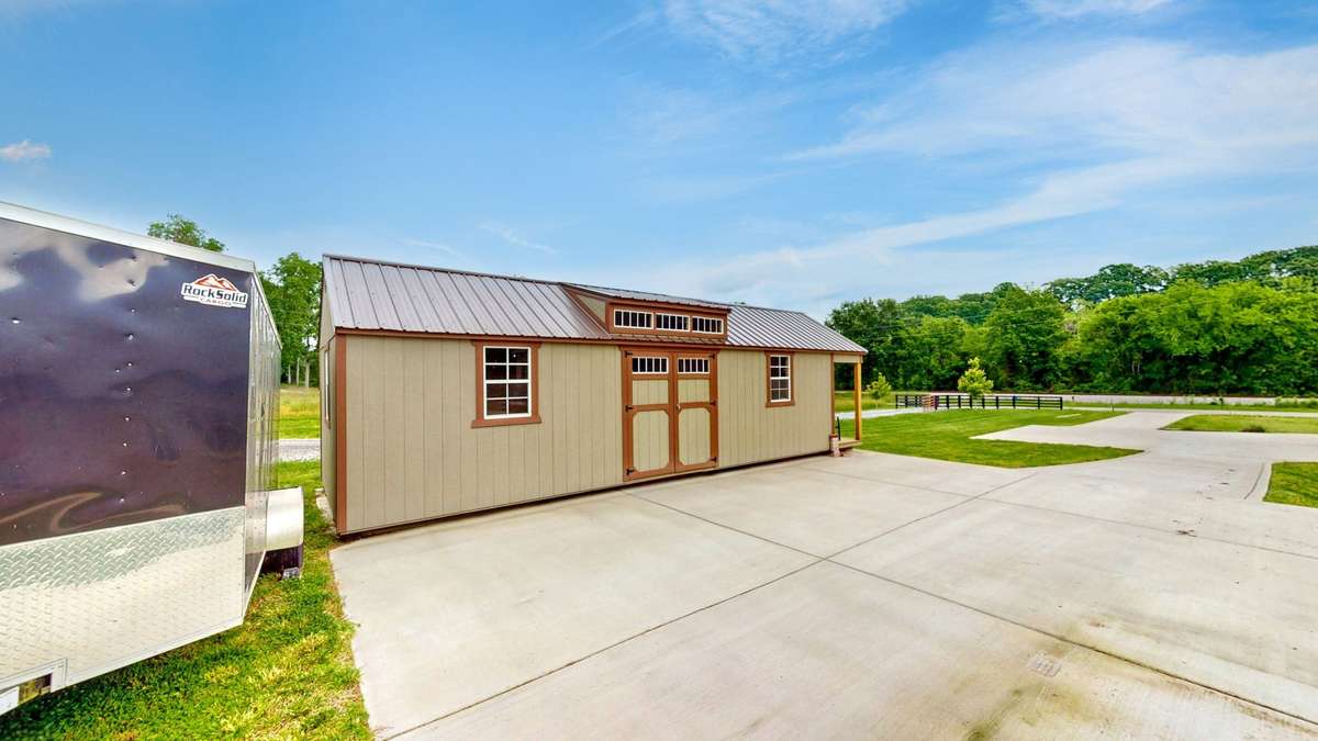 30x40 concrete pad for parking RV or Boat or your future detached garage or workshop. Outbuilding does not convey however purchase may be negotiable
