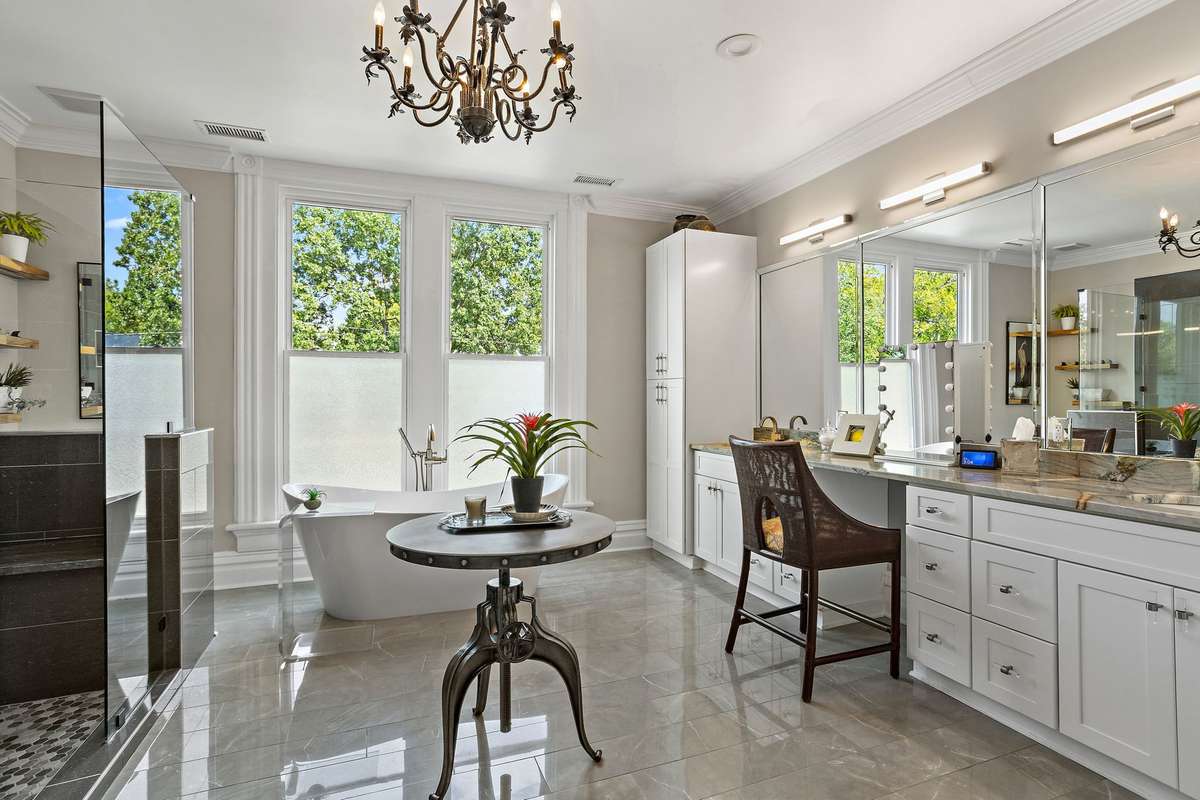 Completely renovated primary with tons of natural light and Marble counters, floor and shower