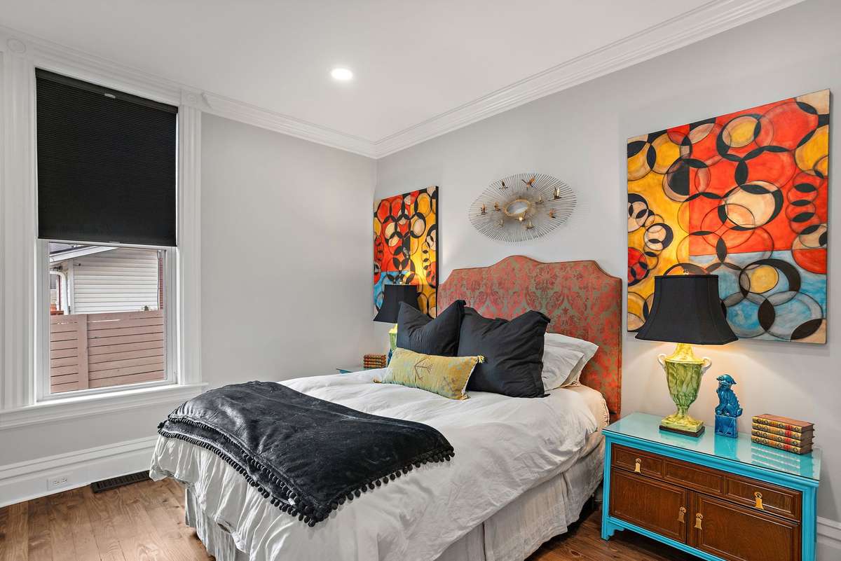 1 of 2 bedrooms on Main floor with some original trim