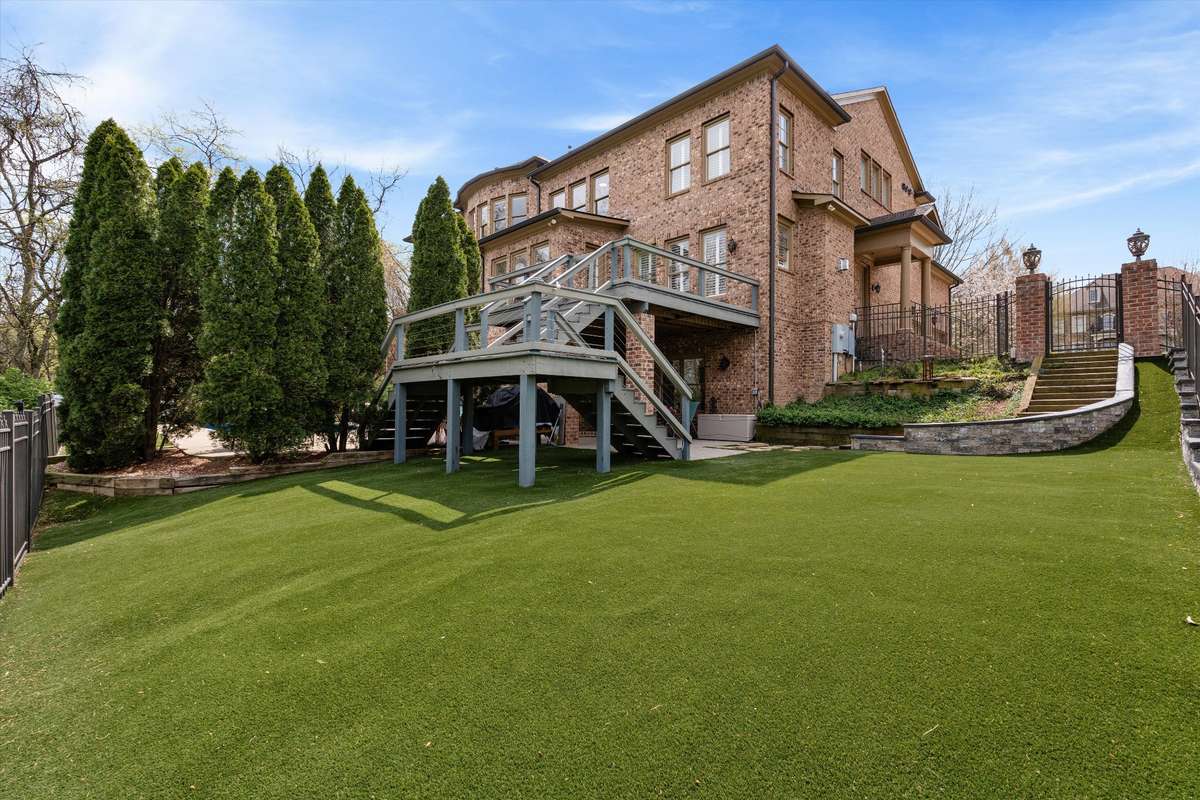 Low maintenance astro turf in fenced yard
