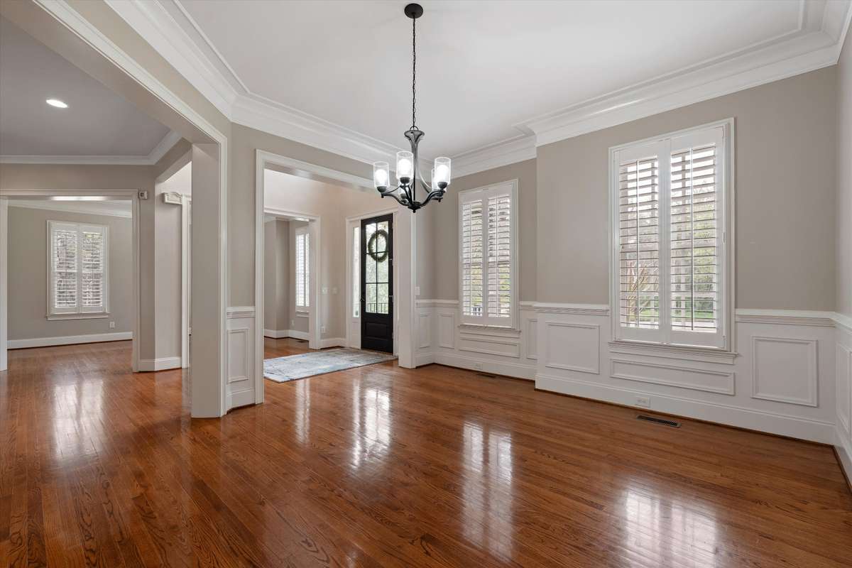 Coming into the home you'll be greeted by plantation shutters, hardwoods and various lighting options