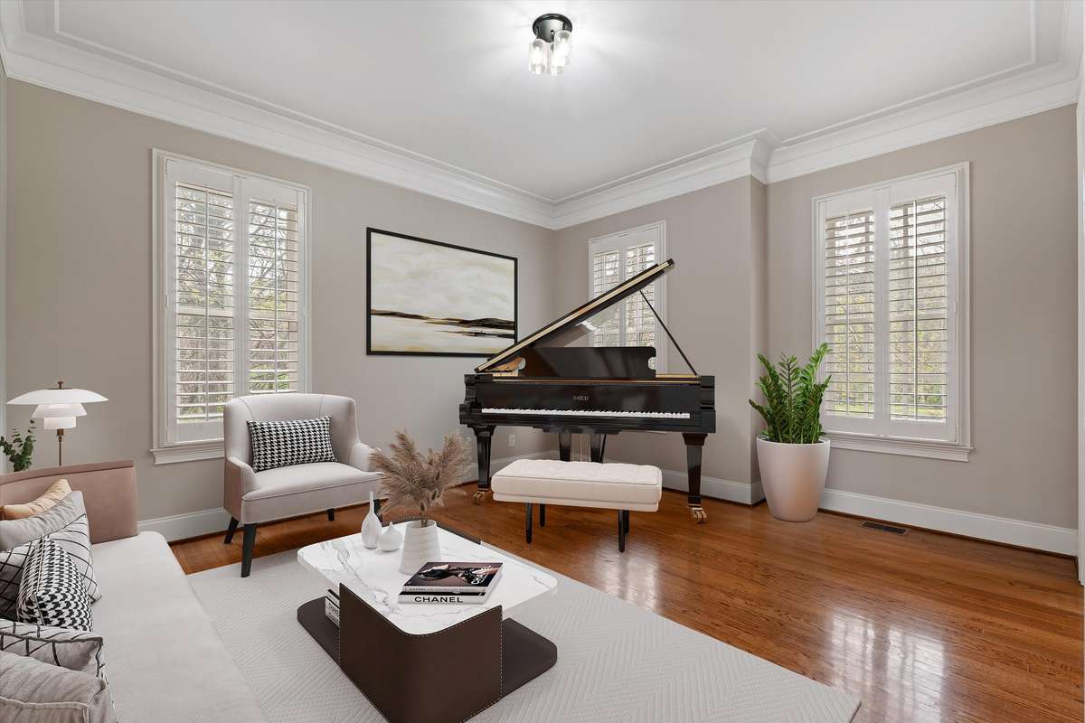 **virtually staged**. As you enter the home, the room to the right offers so many use options--a music room, library or even additional office space