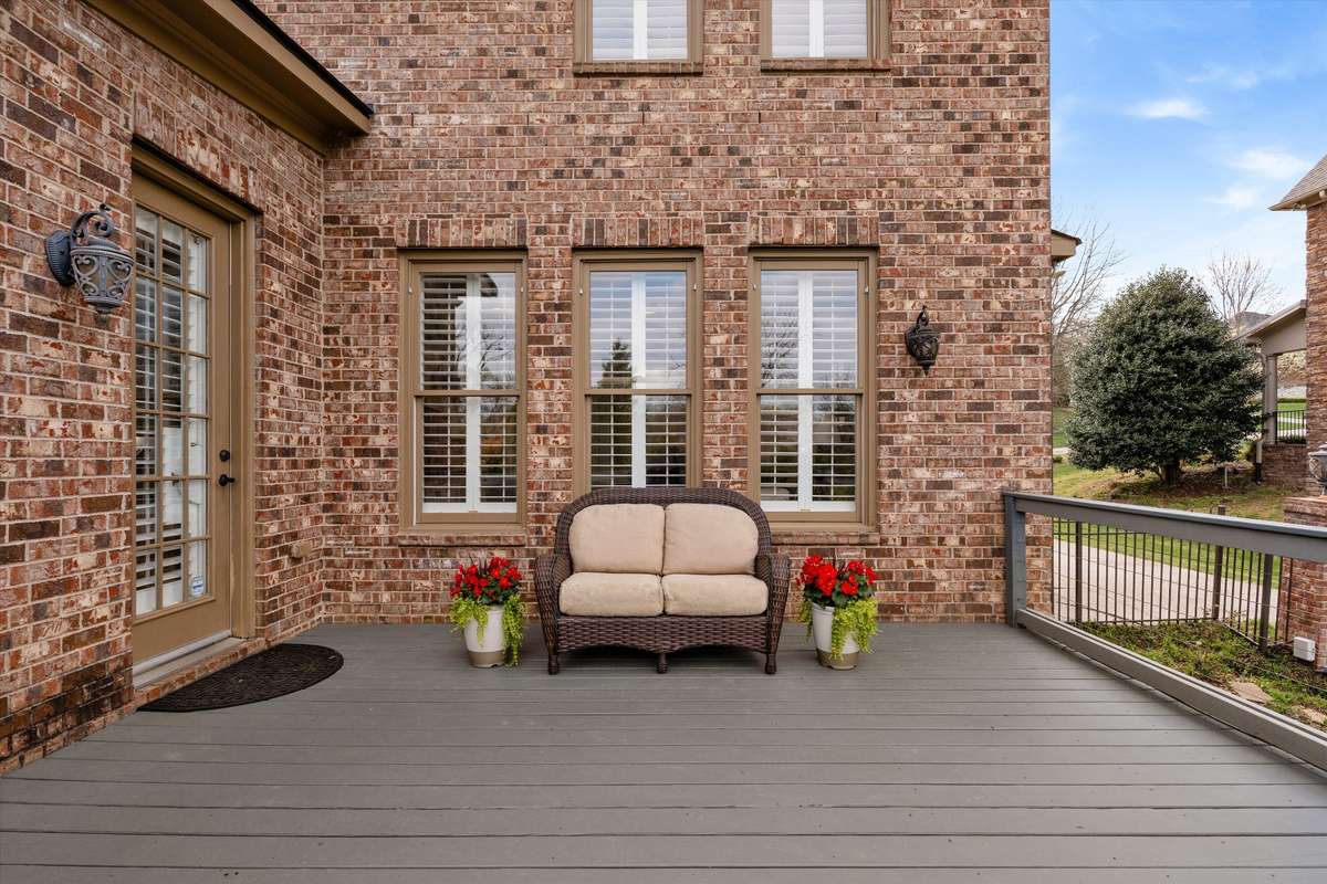 The upstairs deck is located right off the kitchen