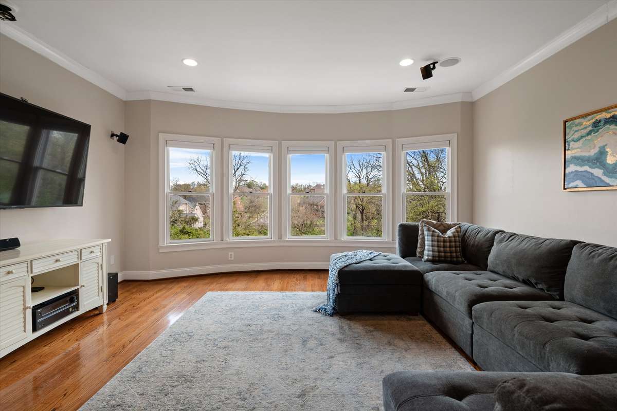 Enjoy the lovely view while catching your favorite show. Each floor has a TV space and a laundry area--allowing for both relaxation and function on each floor