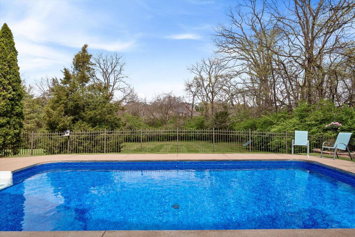 Common space behind the pool allows for added feeling of privacy