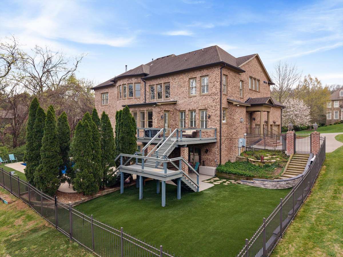 The side and back yard have plenty of space for additional entertainment options/play structures