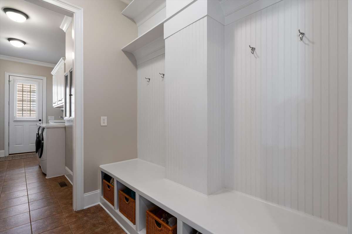 The spacious drop zone has hooks and cubbies to keep you organized as you come and go