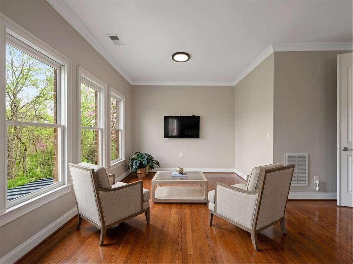 *virtually staged* The 2nd half of the primary suite is a great space for a sitting area or coffee bar