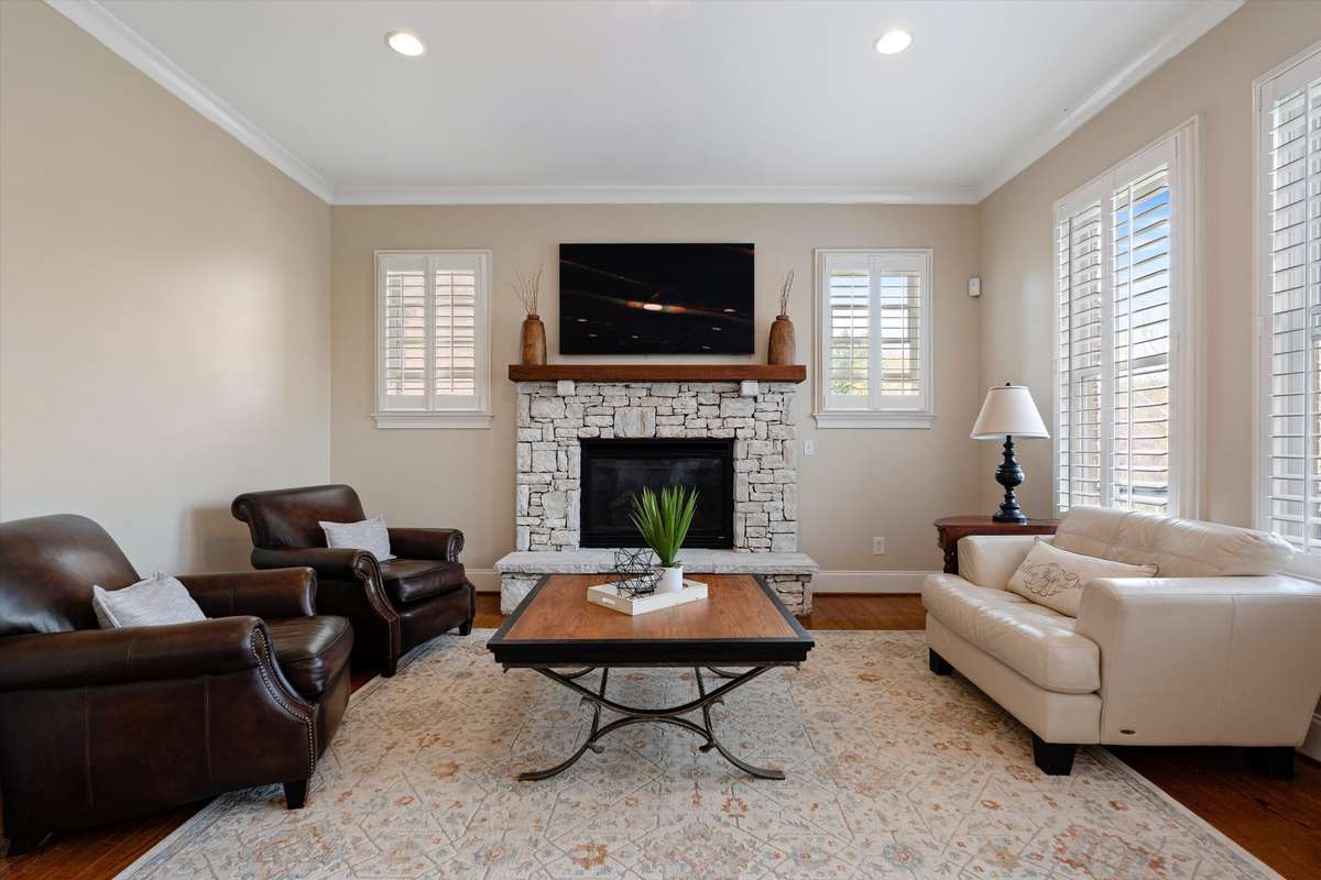 The 2nd of 2 gas log fireplaces can be enjoyed in the keeping room off the kitchen.