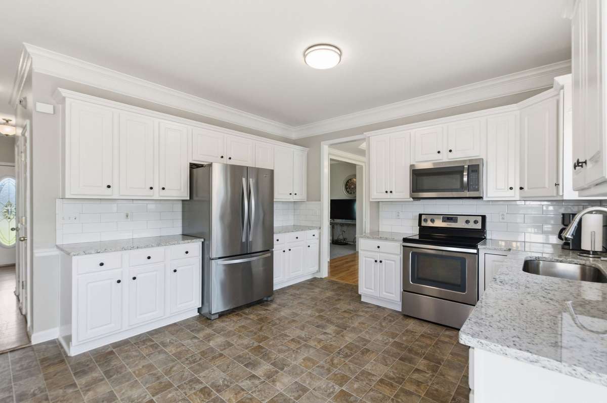 Functional layout with plenty of counter space and storage, seamlessly connected to nearby living areas.