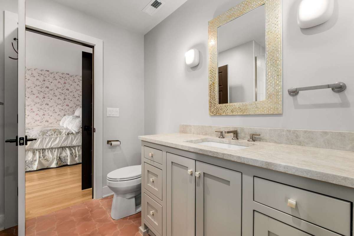 Full bath #2 upstairs, has access to upstairs common living space and a secondary bedroom.