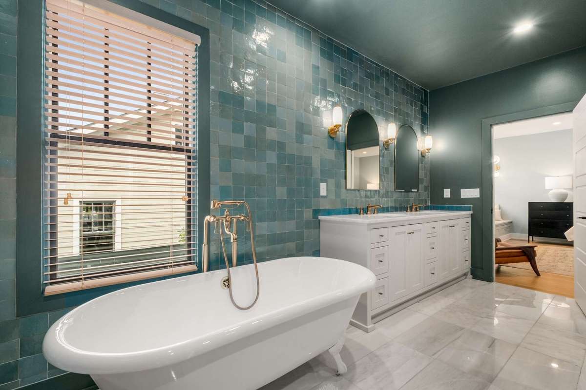 Alternate view of the primary bath, and historic inspired tub.