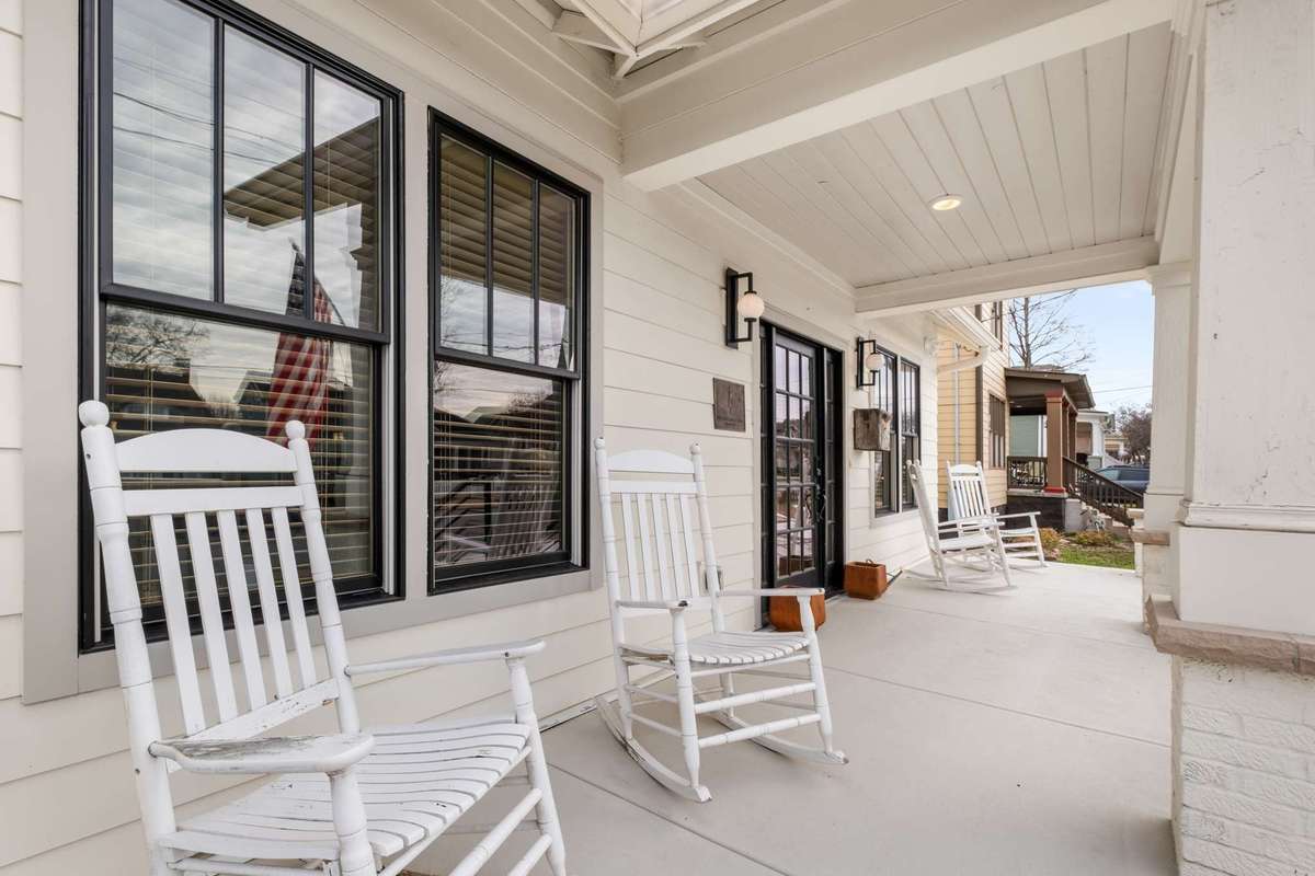 Enjoy the "rocking chair" front porch and get to know your neighbors.  This outdoor living space offers ample room for leisure seating, and a small dining table if desired.
